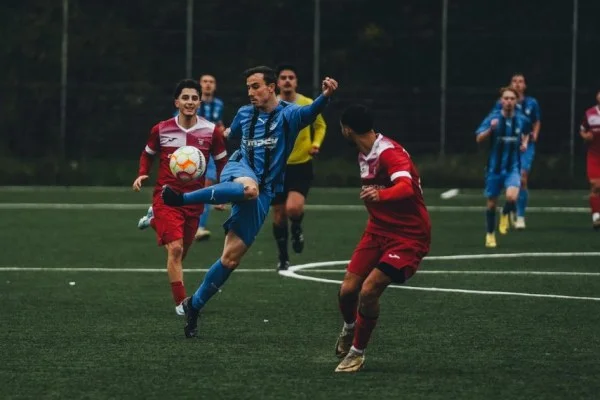 soccer player passing ball